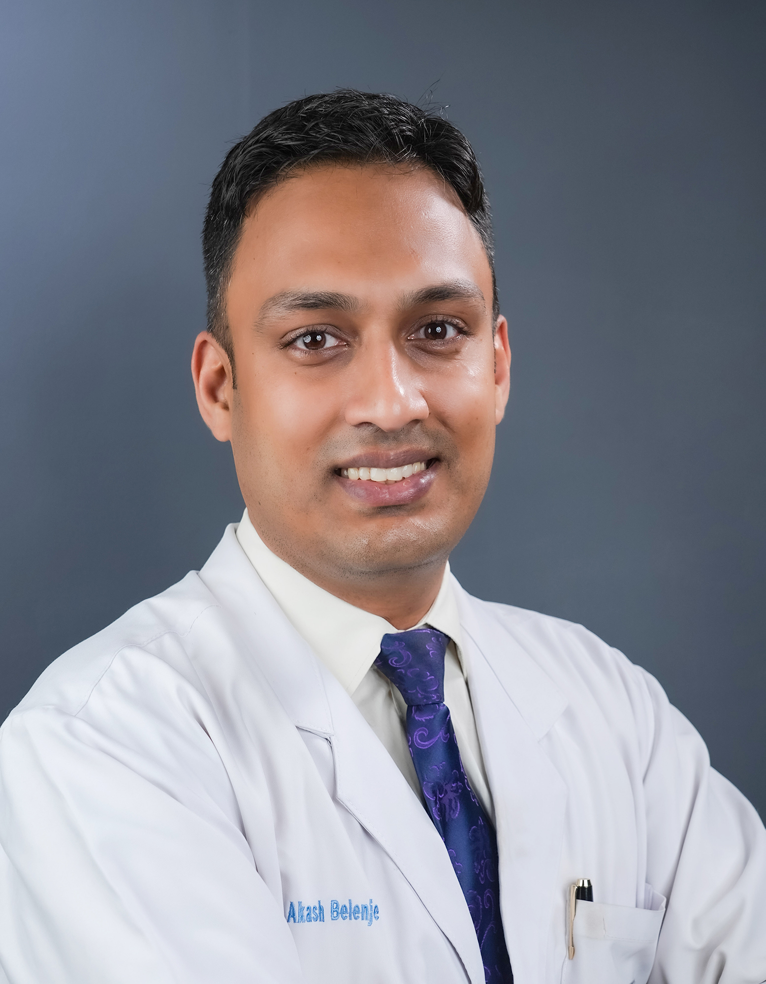 Dr Akash Belenje