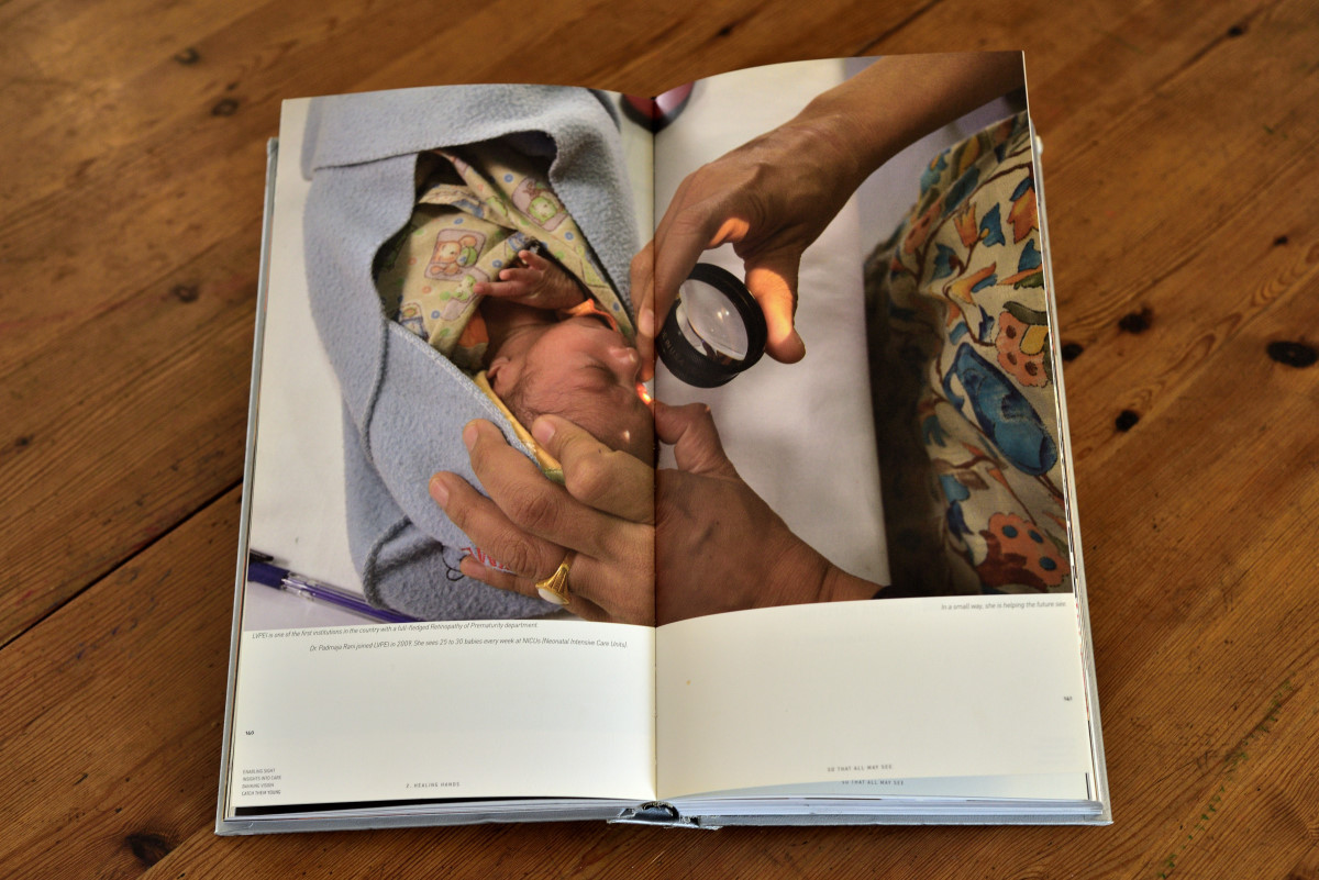 open book with photo of ROP baby